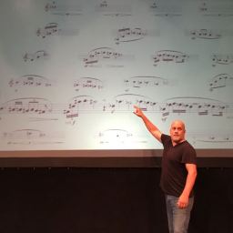 Composer Points at Gb